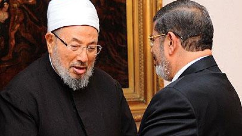 يوسف القرضاوي ومحمد مرسي