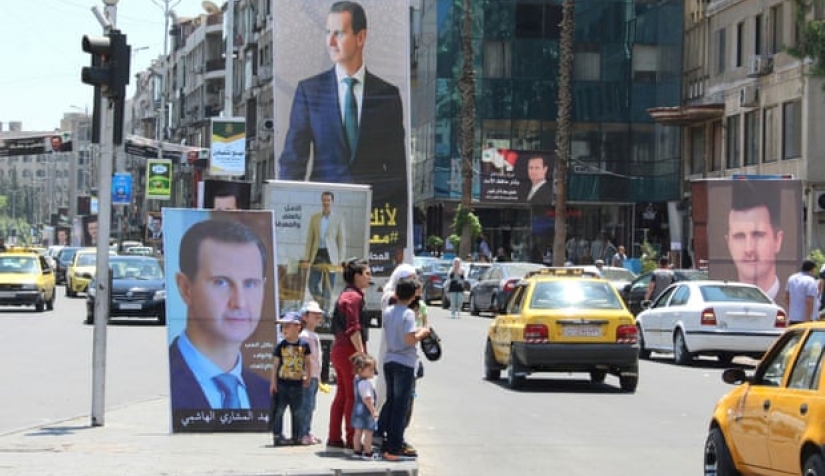 ملصقات في دمشق للرئيس بشار الأسد قبل الانتخابات الرئاسية في أيار/ مايو.