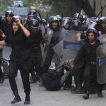 violent-demonstrations-in-020asd_ap_0-e1322072935145