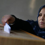 111129124407-egypt-election-cairo-woman-voter-story-top