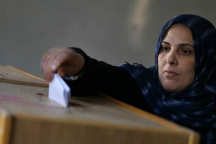 111129124407-egypt-election-cairo-woman-voter-story-top