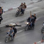 palestinian-gunmen-ride-motorcycles-they-drag-body-man-who-was-suspected-working-israel