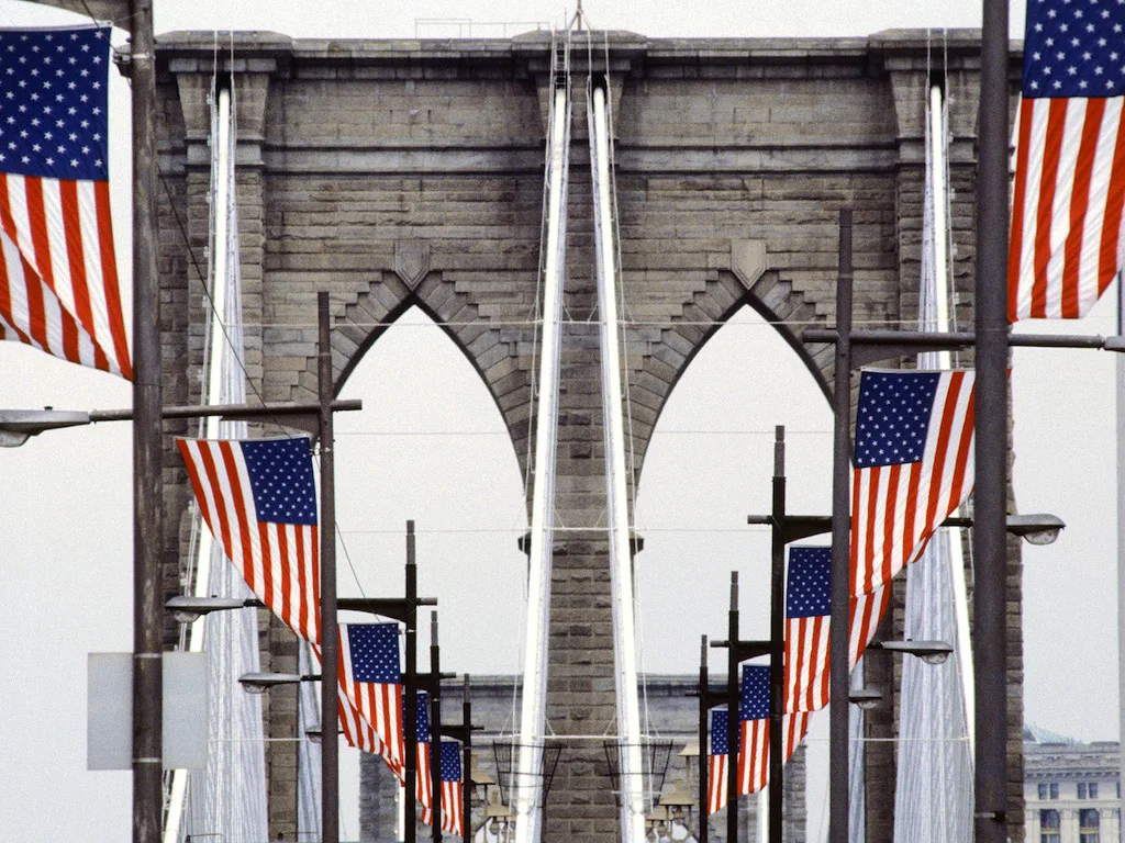 american_flags_lining_brooklyn_bridge__brooklyn__new_york__new_york