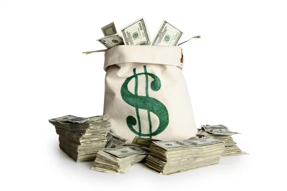 bigstock_Money_bag_and_stacks_of_cash_14085680