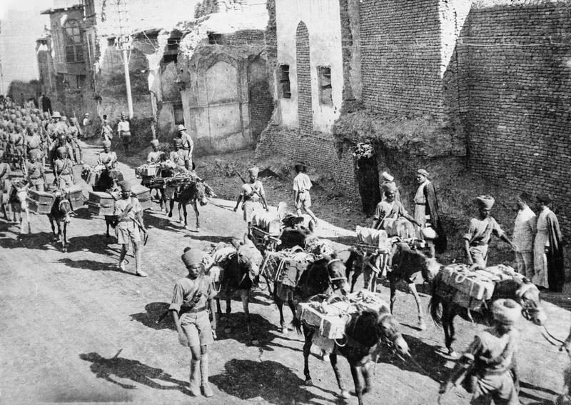 indian_army_transport_section_moves_along_new_street_baghdad_during_the_entry_of_british_forces_into_the_city_on_11_march_191-2