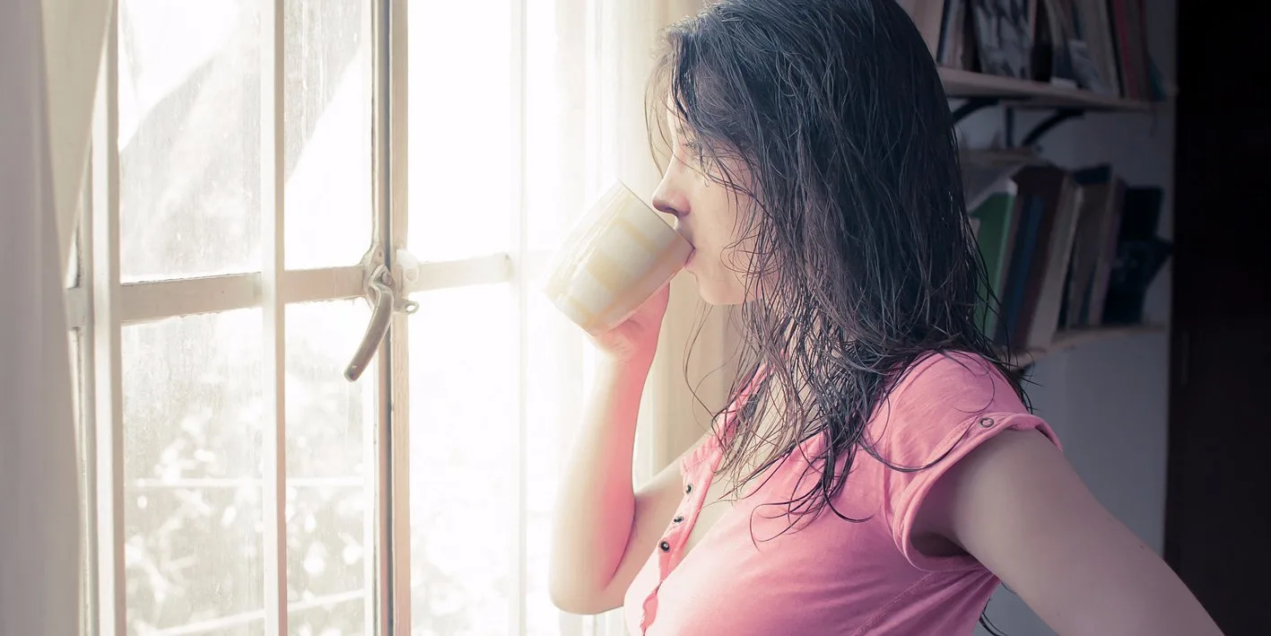 woman-drinking-coffee-morning-thinking-pensive-thoughtful