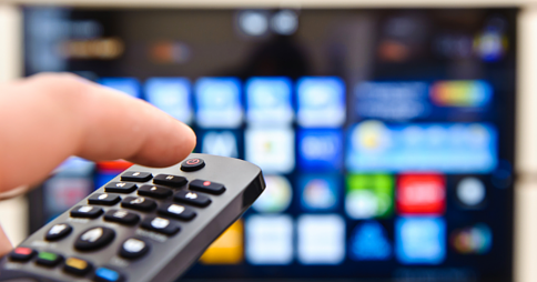 hand_pointing_remote_at_smart_tv