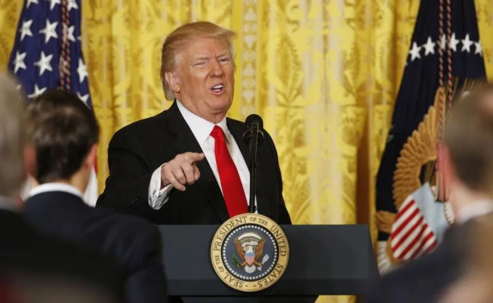 994819-us-president-trump-departs-news-conference-at-the-white-house-in-washington