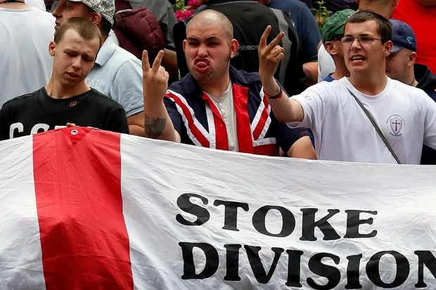 2013-07-20t000000z_977819514_lm1e97k181t01_rtrmadp_3_britain-protest-edl_2