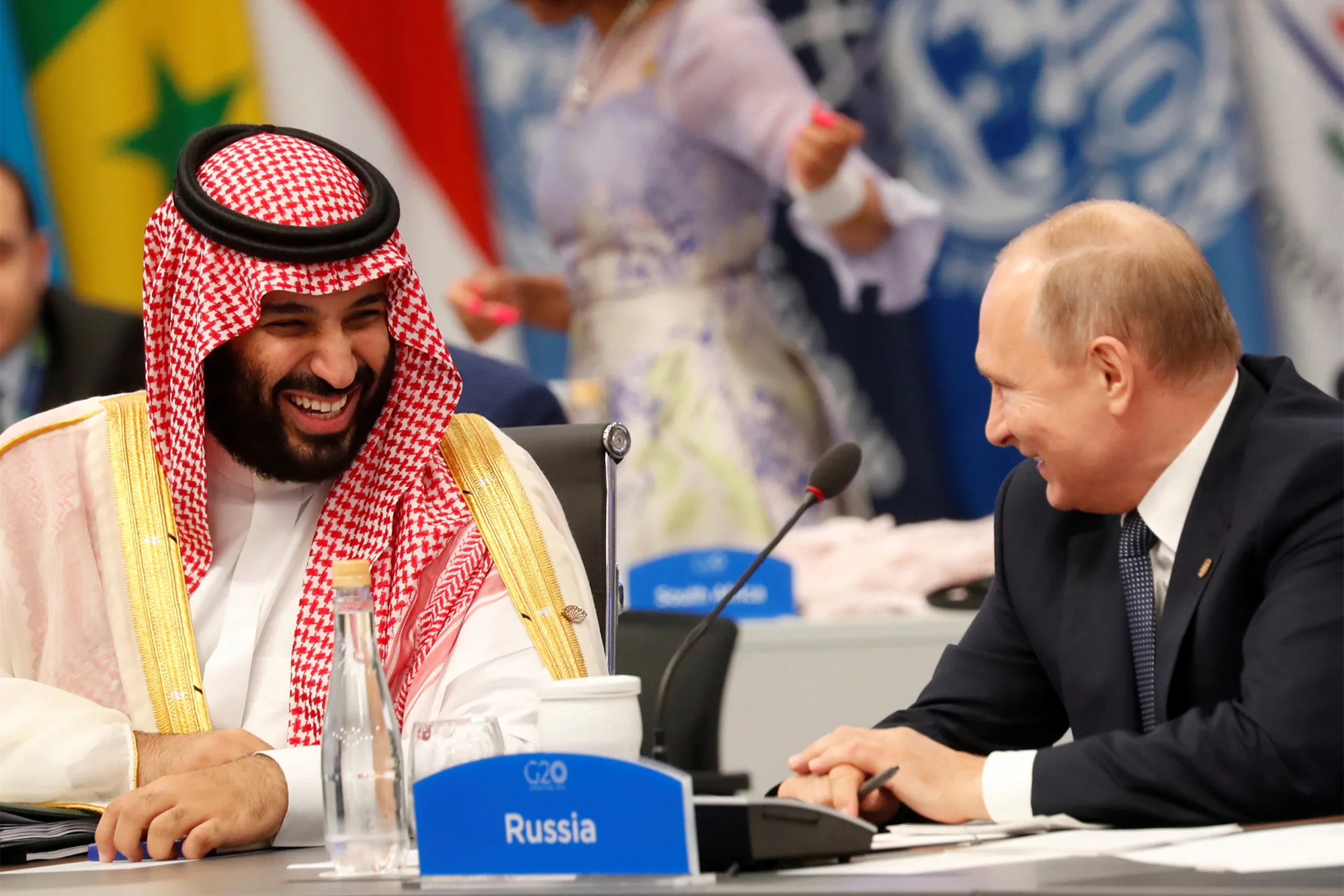 181130-putin-mbs-laugh-feature