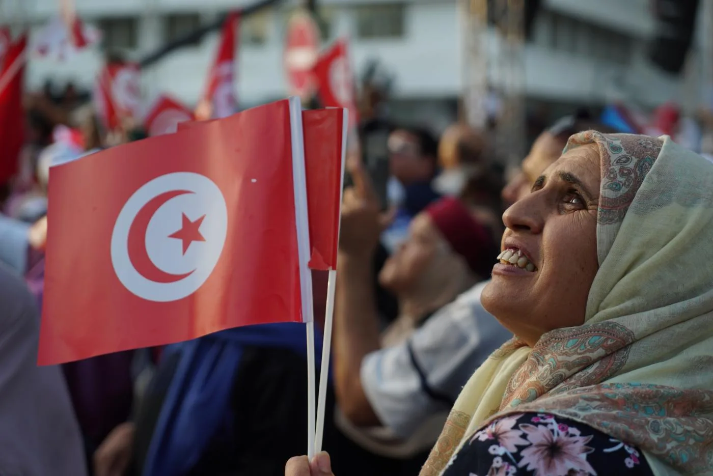 an_ennahdha_supporter_attends_a_rally_in_the_capital_tunis