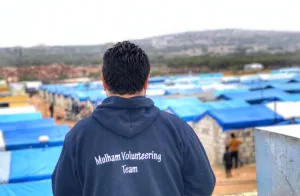 مخيم بجدران حجرية.. أمل نازحي شمال إدلب في فصل الشتاء