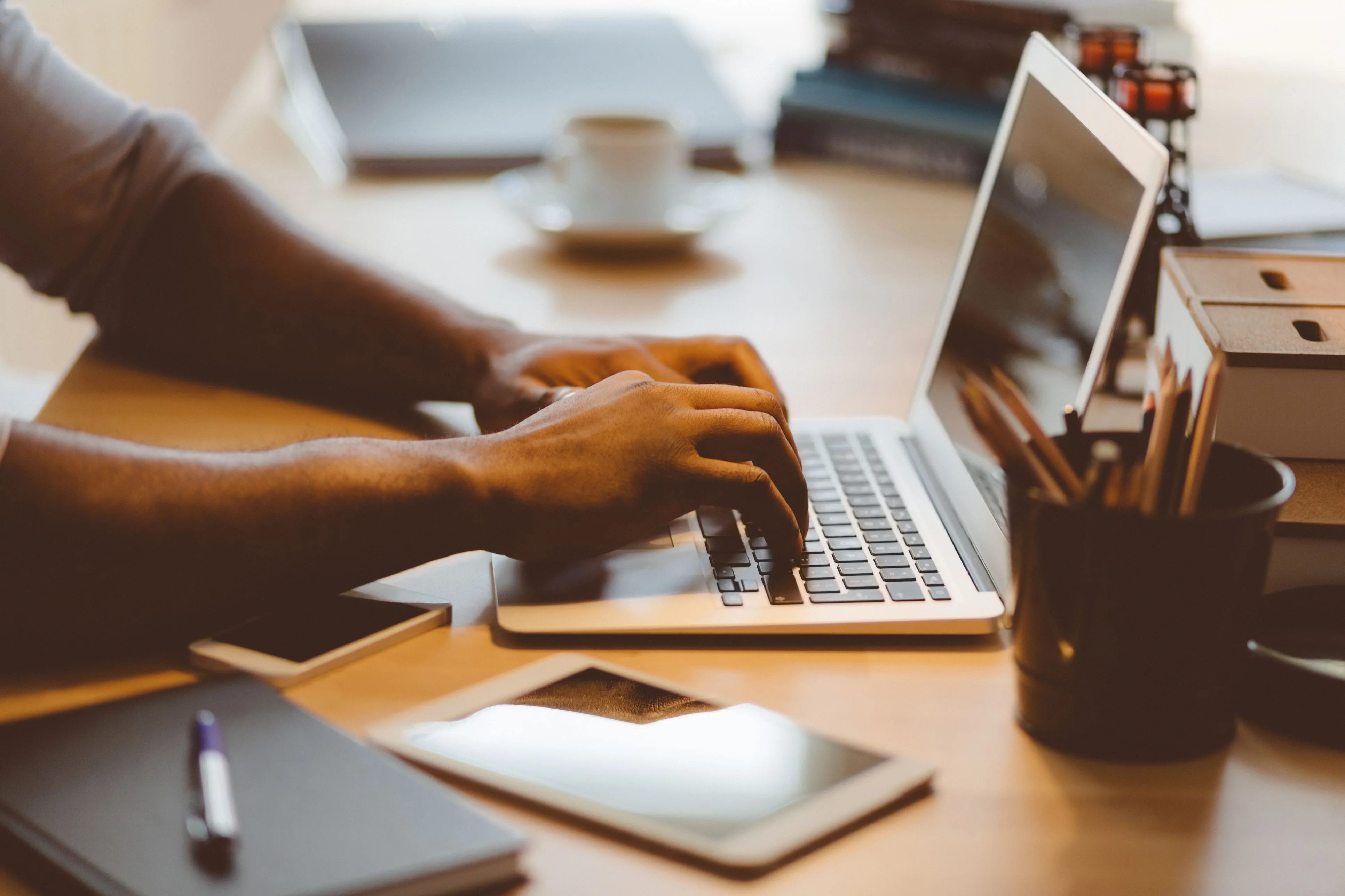 afro-american-young-man-typing-on-laptop-670543770-5b61f8b646e0fb00504f6787