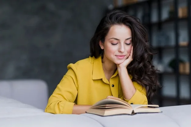 medium-shot-smiley-woman-reading_23-2148294092