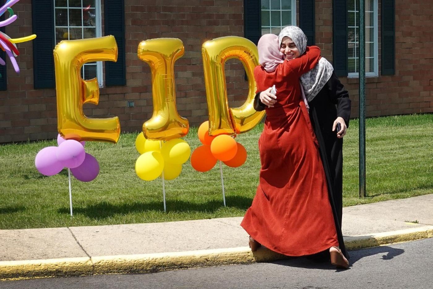 Eid-celebrations-greetings-embrace-USA-Getty-AFP