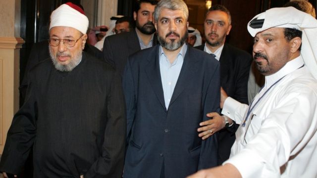 القرضاوي وخالد مشعل