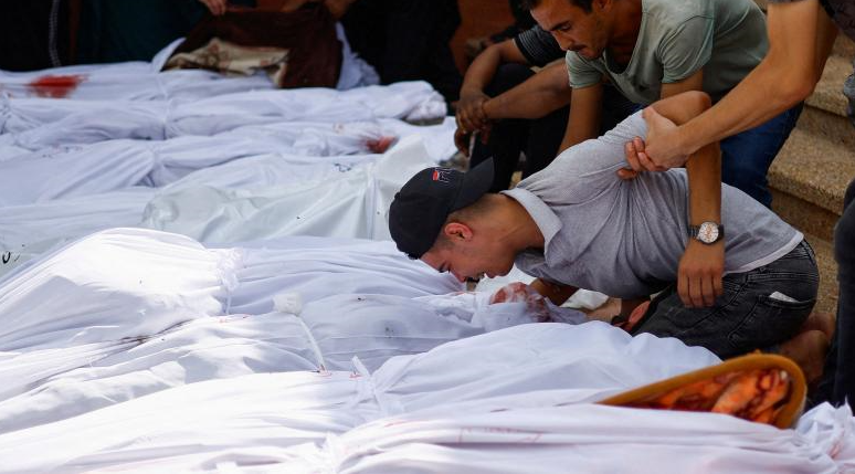 Gaza families search through the corpses for their loved ones 28 نون بوست