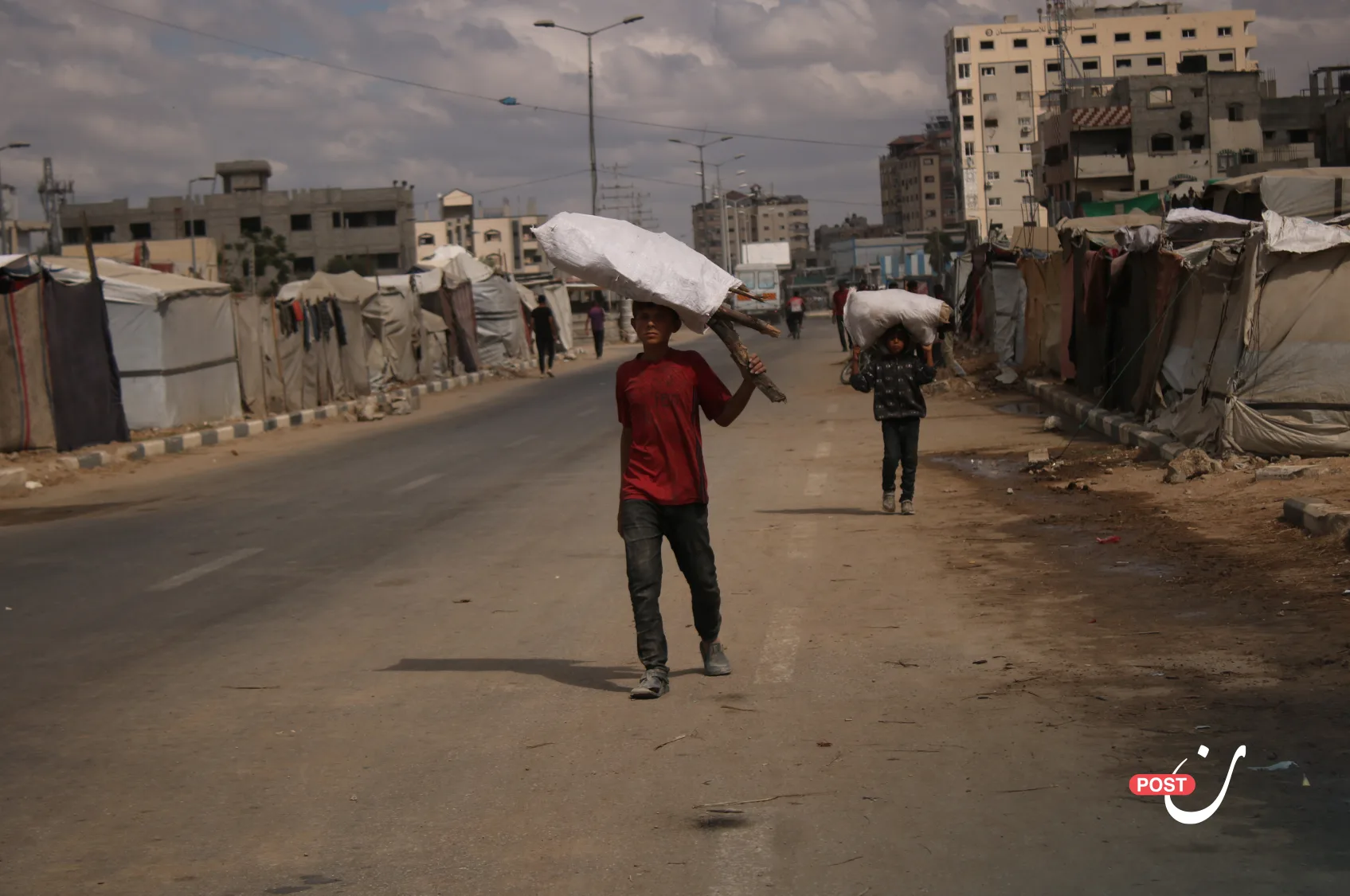 Amid the rubble and graveyards, Gaza’s children are forced into work to support their families 31 نون بوست